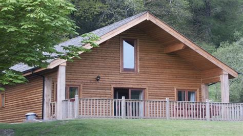This modern log home design features two bedrooms with walk in closets, two full baths, mudroom, two covered decks and an open main level living, kitchen, and. Log Cabin Kits 3 Bedroom 2 Bathroom 2 Story 2 Story Log ...