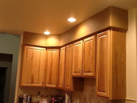 Removing soffits is possible, and it's not necessarily difficult, either. Need help with ugly soffit above kitchen cabinets!
