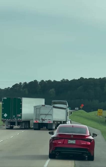 Two Trucks Try To Force Each Other Off The Road In Bizarre Road Rage