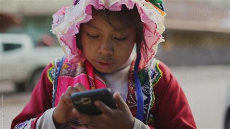 Indigenous Using Technology By Stocksy Contributor Kike Arnaiz