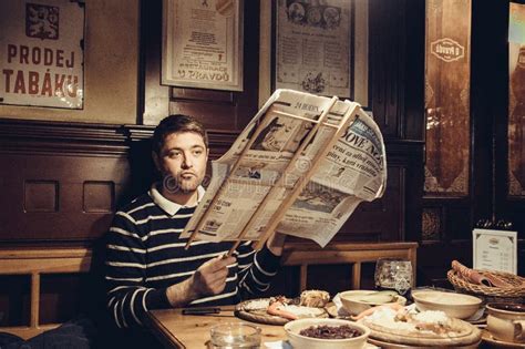 Prague Czech Republic April 28 2016 Man Reading A Evening Newspaper