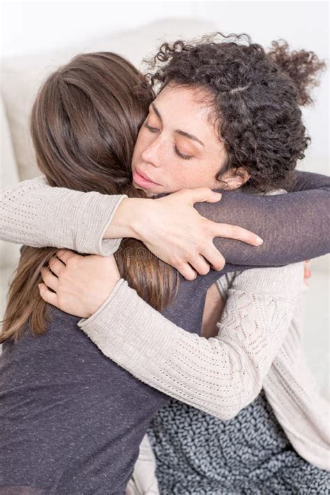 Two Women Giving A Hug Stock Image Image Of Coach Joyful