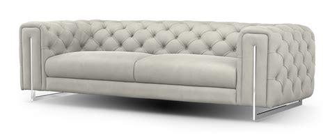 A White Leather Couch With Chrome Legs On An Isolated Background For Use In Interior And