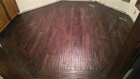 Does black tile grout fade. Porcelain Tile that looks like 3-foot hand-scraped wood ...