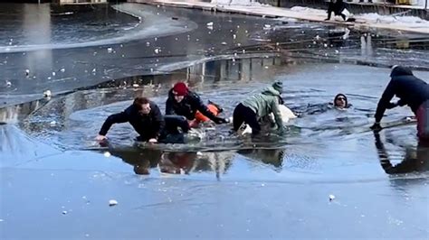 Skaters Rescued After Falling Through Icy Water Youtube