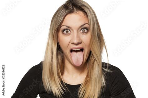 Silly Young Woman Making Funny Faces Acheter Cette Photo Libre De Droit Et Découvrir Des