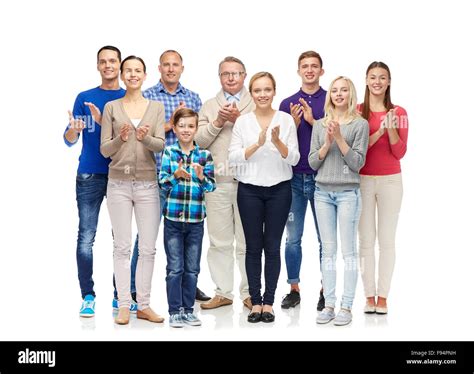Group Of Smiling People Applauding Stock Photo Alamy