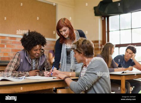 Students Working Together In Class Stock Photo Alamy