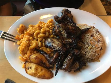 The deliciously seasoned jerk chicken and goat curry were excellent. photo0.jpg - Picture of Cool Runnings Jamaican Restaurant ...