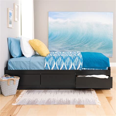 Sleep soundly beneath a modern headboard, and above ample storage space with this bed, available with underbed drawers. Shop Prepac Black Twin Platform Bed with Storage at Lowes.com