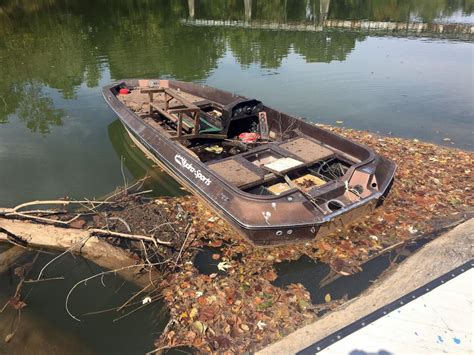 Abandoned Bass Boat Gets Hung Up On A Dock At Ridge Ferry Park Police