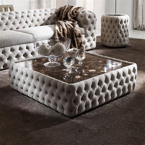 Marrying modern and glamorous elements, this two tier coffee table sets a sleek and chic foundation in your living room layout. Modern Button Upholstered Nubuck Leather Square Coffee ...