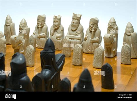 Viking Style Chess Pieces On A Chequered Chess Board Stock Photo Alamy