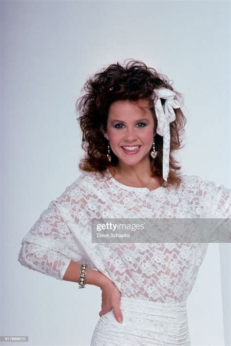 Portrait of American actress Linda Blair, dressed in a white lace ...