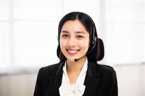 Call Centre Female Operator Smiling Asian Business Woman Receptionist Wearing Headphone Video