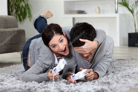 Cute Couple Playing Video Games — Stock Photo © Photography33 9998202