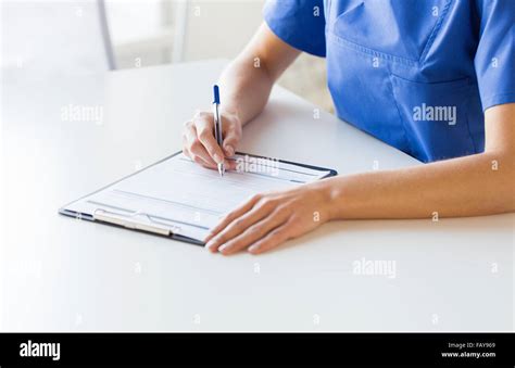 Nurse Writing Notes Hi Res Stock Photography And Images Alamy