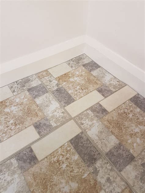 If the edges of vinyl floor tile are starting to curl up, any diyer can easily fix the tiles with adding interest to a tile floor is as simple as laying tiles diagonally instead of squared off with the wall. Floor Tiles Self Adhesive Vinyl Flooring Kitchen Bathroom ...