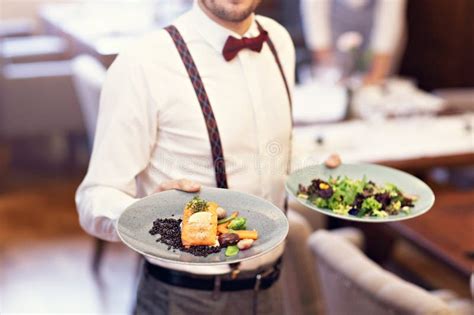 Two Waiters Standing In Coffee Shop Stock Image Image Of Waitress