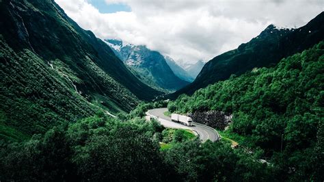 Download Wallpaper 1920x1080 Mountains Road Car Clouds Norway Full Hd Hdtv Fhd 1080p Hd