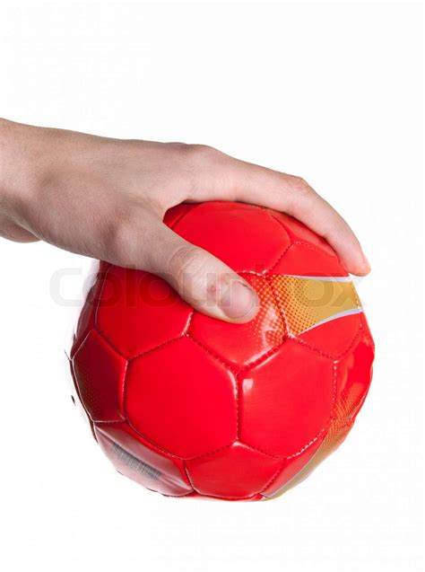 A Hand Hold A Red Ball Isolated Stock Image Colourbox