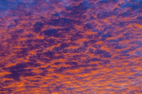 Dramatic Sunset Sky With Clouds Painted In Vivid Red And Orange Tones