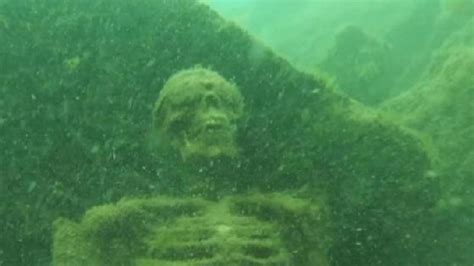 Scuba Diver Finds 2 Skeletons That Appear To Be Having Tea Party