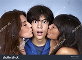 Two Young Women Kissing Teenage Boy Stock Photo 343480127 - Shutterstock