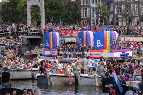 travel proud by boat at the gaypride canal parade with boats at amsterdam the