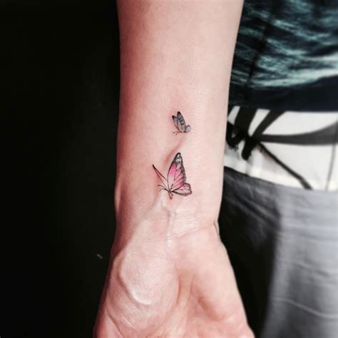 Https://tommynaija.com/tattoo/breathtaking 3d Tattoos Designs Women Butterfly Cross And Heart