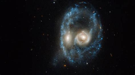 Nasa Hubble Telescope Captures ‘ Ghostly Face In Collision Of Two
