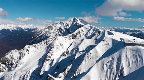 Aerial View Of Snowy Mountain Peak Stock Footage Sbv 322693685