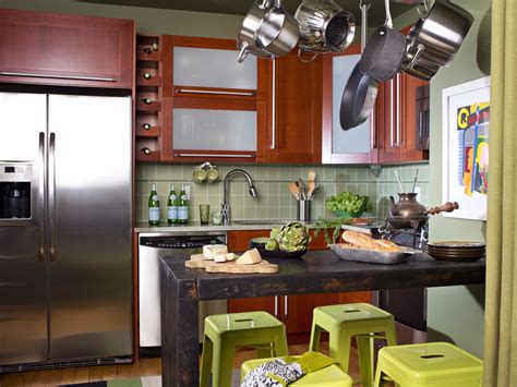 Pops of orange infuses energy into a small kitchen design scheme. Small Kitchen Design Ideas & Pictures | HGTV