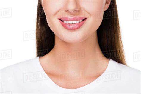 Close Up View Of Smiling Woman With Nude Makeup Isolated On White