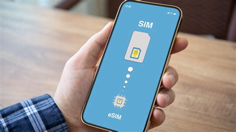 Male Hand Holding Phone With Sim Card Replacement On Esim Menos Fios