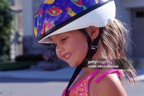 Girl Wearing Bicycle Helmet High Res Stock Photo Getty Images