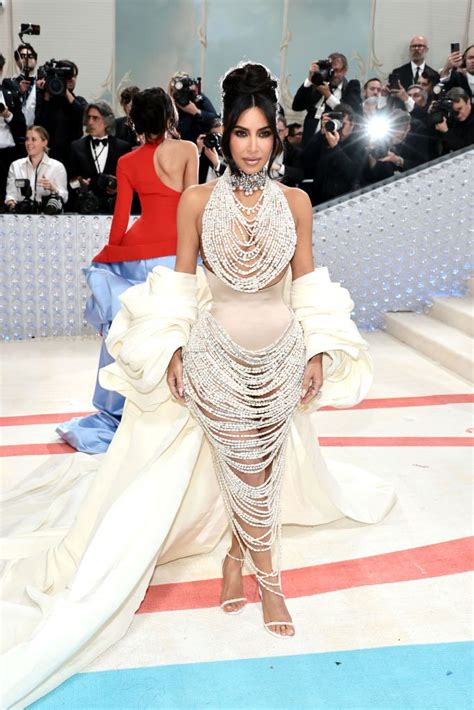 Kim Kardashian Dresses Red Carpet