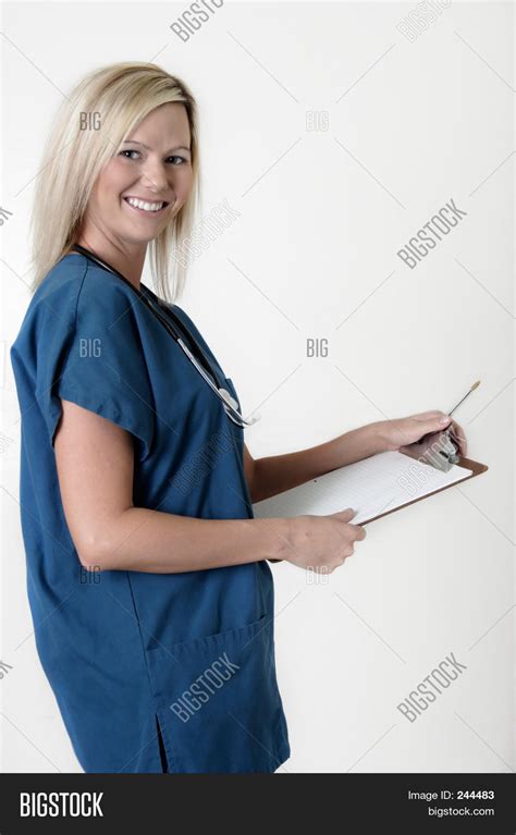 Pretty Nurse Holding Image Photo Free Trial Bigstock
