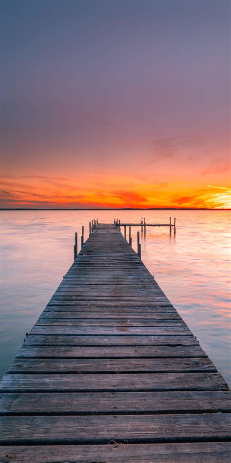 Download 1440x2880 wallpaper pier, sunset, beautiful seascape, beach ...