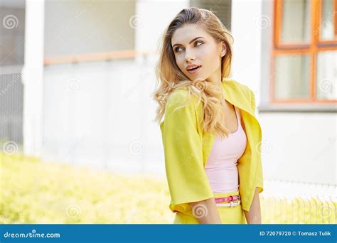 Beautiful Blonde Young Woman Walking On The Street Stock Photo Image