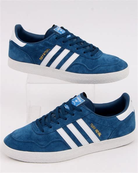 Begin every match or workout in comfort and style with our range of adidas men's clothing, shoes and sportswear accessories. Adidas Turf Royal Trainers Legend Marine - 80s Casual Classics