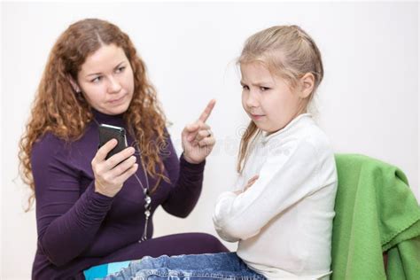 Mom Scolding Child For Viewing Inappropriate Content On Your Smartphone