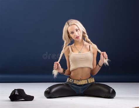Attractive Blond Woman Sitting On Her Knees Stock Photo Image Of