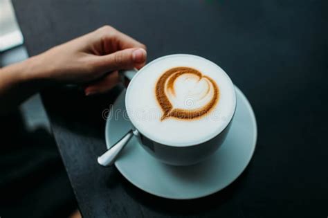 Cup Of Coffee With A Foam In The Form Of A Heart Coffee With Foam