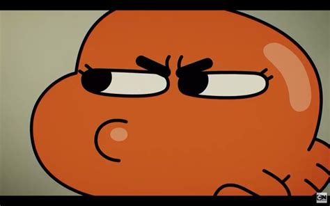 An Orange Cartoon With Eyes And Nose Looking At Something