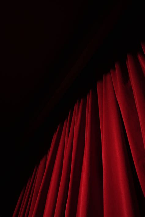 Spotlight On A Red Curtain · Free Stock Photo