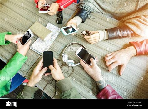 Group Of Friends Are Addicted Using Mobile Phone Devices Upper Point