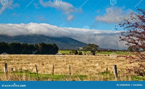 Low Storm Clouds Rolling Over Mountain Top Stock Photography Image