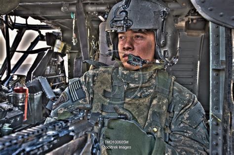 Hdr Image Of A Uh 60 Black Hawk Door Gunner Manning A M240 Machine Gun