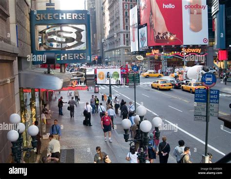 A Busy Sidewalk In Times Square New York City Usa Stock Photo Alamy